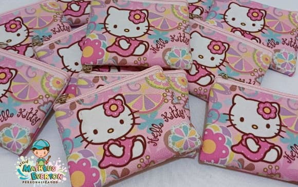 35 Porta Moedas Hello Kitty Tamanho: 10x12cm